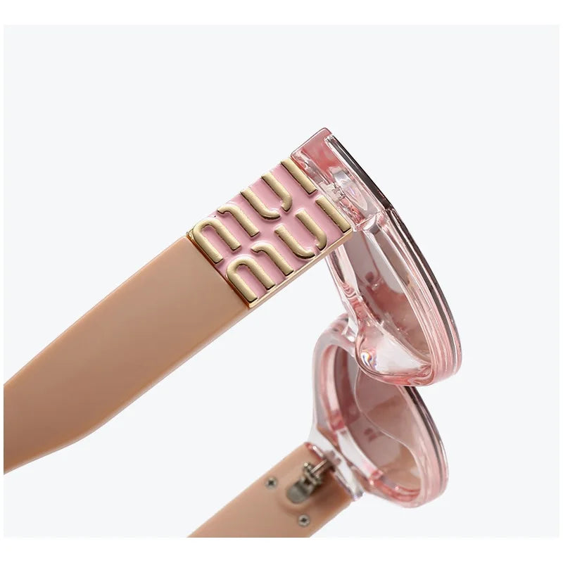 MUI MUI OVAL GLASSES