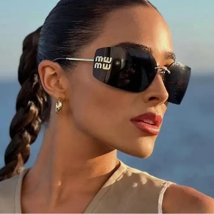 MUI MUI CURVED LUXURY SUNGLASSES